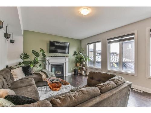 1104 Edinburgh Drive, Woodstock, ON - Indoor Photo Showing Living Room With Fireplace