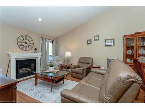 22-20 Windemere Place, St. Thomas, ON - Indoor Photo Showing Living Room With Fireplace