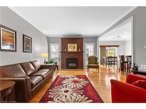 5 Blue Heron Drive, Ilderton, ON - Indoor Photo Showing Living Room With Fireplace