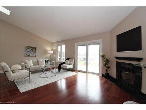 24-90 Ontario Street S, Grand Bend, ON - Indoor Photo Showing Living Room With Fireplace
