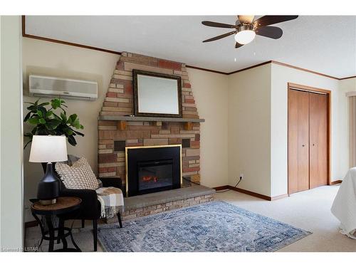 9987 Port Franks Estate Drive, Port Franks, ON - Indoor Photo Showing Living Room With Fireplace