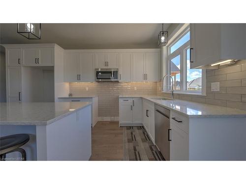 27 Lois Court, Grand Bend, ON - Indoor Photo Showing Kitchen With Upgraded Kitchen