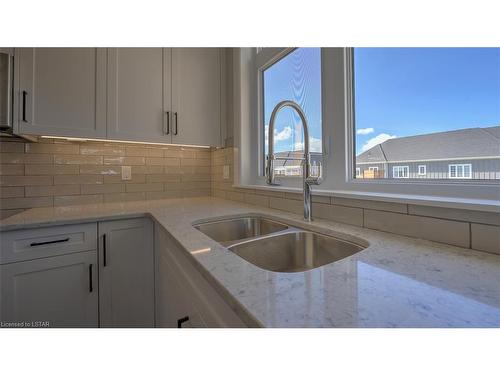 27 Lois Court, Grand Bend, ON - Indoor Photo Showing Kitchen With Double Sink