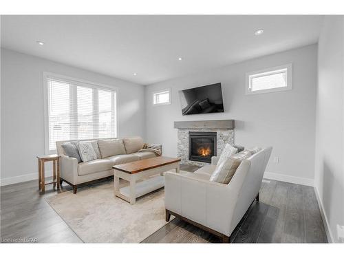 178 Spencer Avenue, Lucan, ON - Indoor Photo Showing Living Room With Fireplace