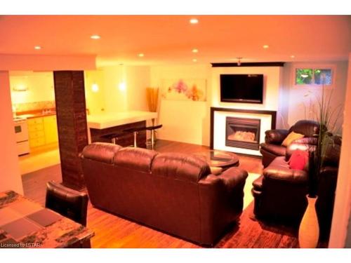 11 Mcalpine Avenue, London, ON - Indoor Photo Showing Living Room With Fireplace