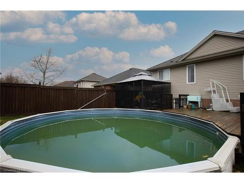 12 Hickory Lane, St. Thomas, ON - Outdoor With Above Ground Pool With Backyard