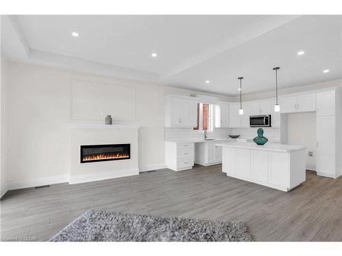 4 Bouw Place, Dutton, ON - Indoor With Fireplace