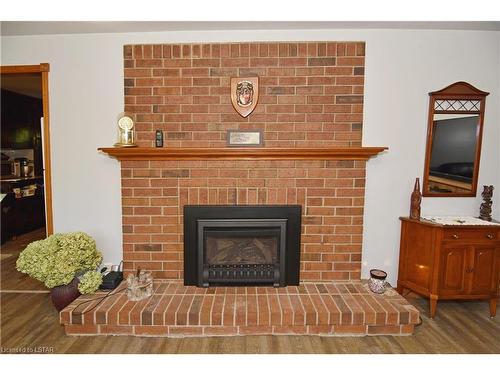 9685 Army Camp Road, Lambton Shores, ON - Indoor Photo Showing Living Room With Fireplace
