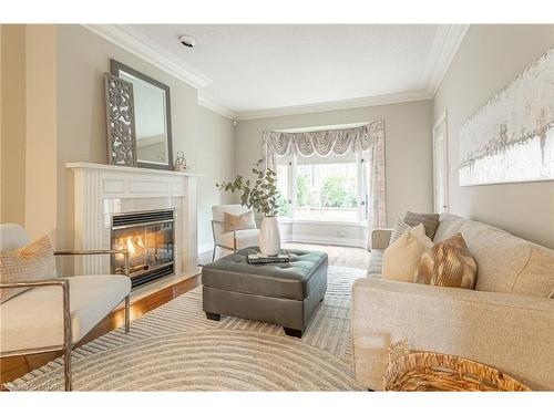 44-40 Quinella Drive, London, ON - Indoor Photo Showing Living Room With Fireplace