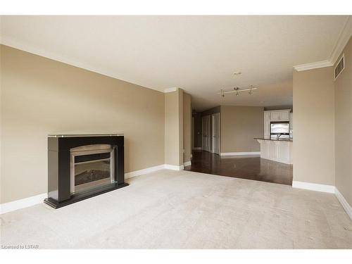 707-250 Pall Mall Street, London, ON - Indoor Photo Showing Living Room With Fireplace