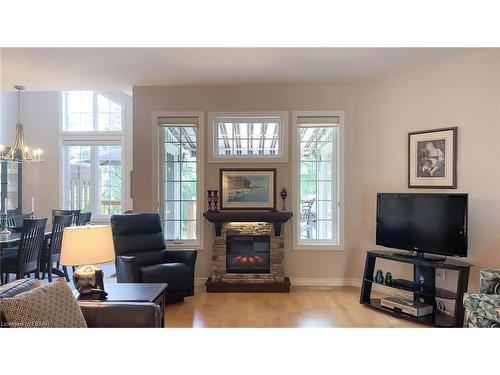 5 Oakwood Links Lane, Grand Bend, ON - Indoor Photo Showing Living Room With Fireplace
