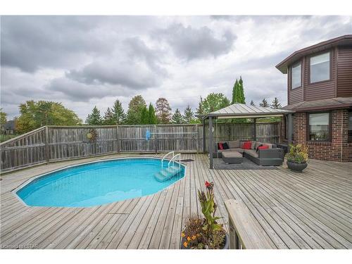 2578 Jenedere Court, London, ON - Outdoor With Above Ground Pool With Deck Patio Veranda