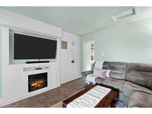 104 Main Street, Glencoe, ON - Indoor Photo Showing Living Room With Fireplace