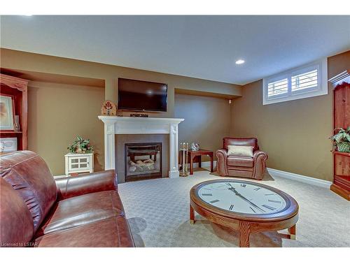 17-725 Eagletrace Drive, London, ON - Indoor Photo Showing Basement With Fireplace