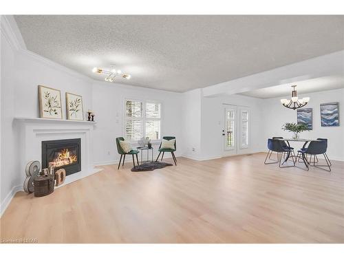 44-410 Ambleside Drive, London, ON - Indoor Photo Showing Living Room With Fireplace