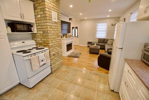 742 Oxford Street E, London, ON - Indoor Photo Showing Kitchen With Fireplace