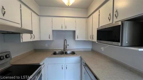 1-82 Finch Drive, Sarnia, ON - Indoor Photo Showing Kitchen With Double Sink