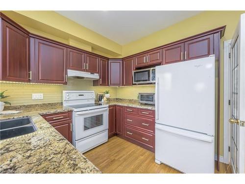 20 Regina Street, London, ON - Indoor Photo Showing Kitchen With Double Sink