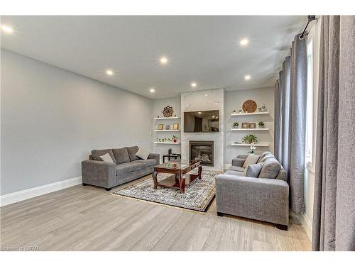 98 Locky Lane, Komoka, ON - Indoor Photo Showing Living Room With Fireplace