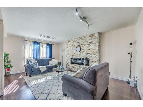 3382 Emilycarr Lane, London, ON - Indoor Photo Showing Living Room With Fireplace