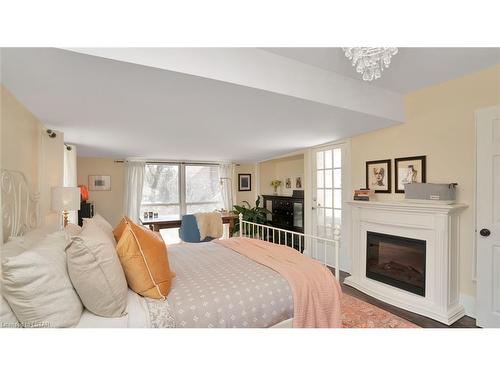 45 Mayfair Drive, London, ON - Indoor Photo Showing Bedroom With Fireplace