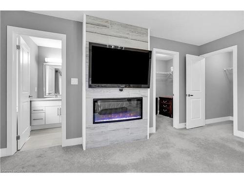 413 Edgevalley Road, London, ON - Indoor With Fireplace