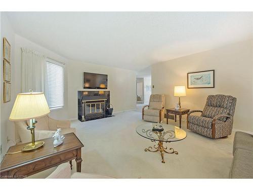 36-14 Doon Drive, London, ON - Indoor Photo Showing Living Room With Fireplace