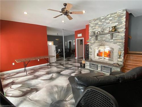 61 Kakagi Lake Road, Nestor Falls, ON - Indoor Photo Showing Living Room With Fireplace