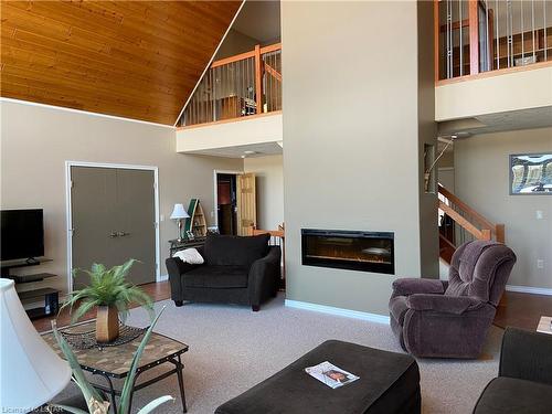 61 Kakagi Lake Road, Nestor Falls, ON - Indoor Photo Showing Living Room With Fireplace