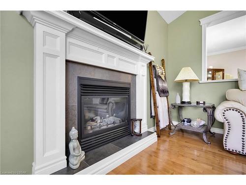6517 Beattie Street, London, ON - Indoor Photo Showing Living Room With Fireplace