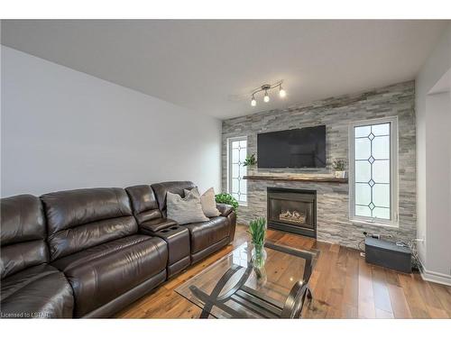 26-1100 Byron Baseline Road, London, ON - Indoor Photo Showing Living Room With Fireplace