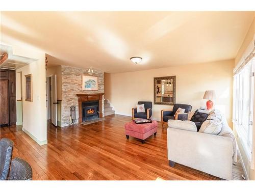 19 Shady Lane, Grand Bend, ON - Indoor Photo Showing Living Room With Fireplace
