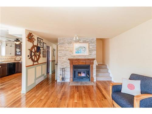 19 Shady Lane, Grand Bend, ON - Indoor Photo Showing Living Room With Fireplace