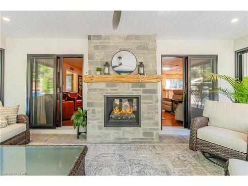 10308 Beach O' Pines Road, Grand Bend, ON - Indoor Photo Showing Living Room With Fireplace
