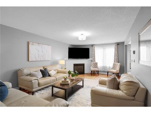 691 Clearwater Crescent, London, ON - Indoor Photo Showing Living Room With Fireplace