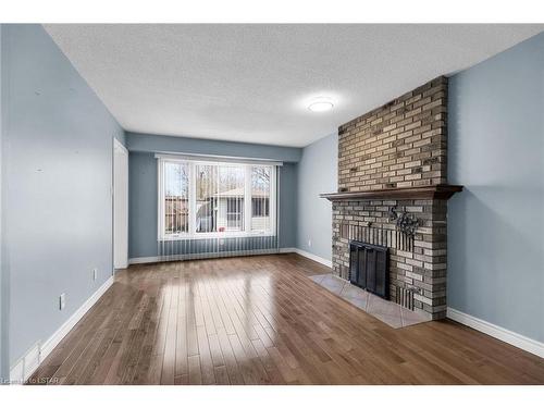 6 Martinet Avenue, London, ON - Indoor Photo Showing Living Room With Fireplace