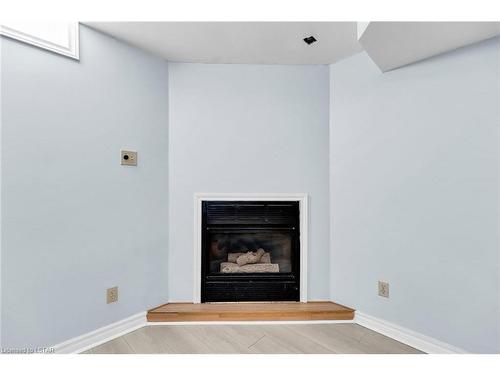 6 Martinet Avenue, London, ON - Indoor Photo Showing Living Room With Fireplace