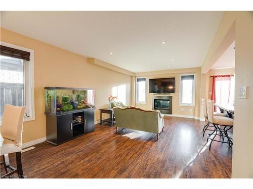 6861 Vallas Circle, London, ON - Indoor Photo Showing Other Room With Fireplace
