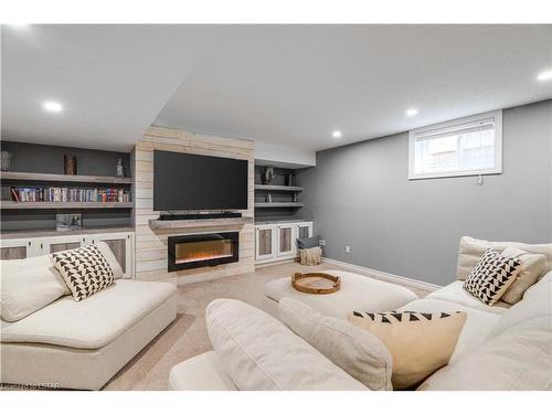 1233 Lawson Road, London, ON - Indoor Photo Showing Basement With Fireplace