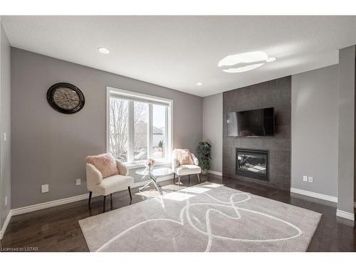 1215 Gough Road, London, ON - Indoor Photo Showing Living Room With Fireplace
