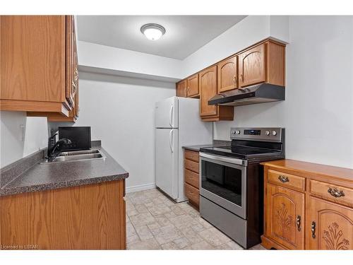 304-3355 Sandwich Street, Windsor, ON - Indoor Photo Showing Kitchen With Double Sink