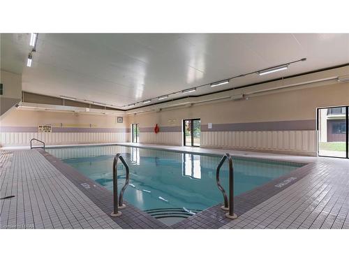 1119-9099 Riverside Drive E, Windsor, ON - Indoor Photo Showing Other Room With In Ground Pool