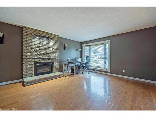 1379 Kostis Avenue, London, ON - Indoor Photo Showing Living Room With Fireplace