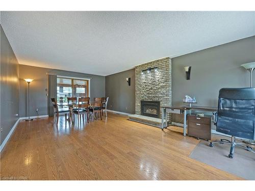 1379 Kostis Avenue, London, ON - Indoor With Fireplace