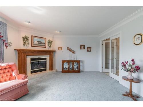 41 Abbey Lane, Exeter, ON - Indoor Photo Showing Living Room With Fireplace