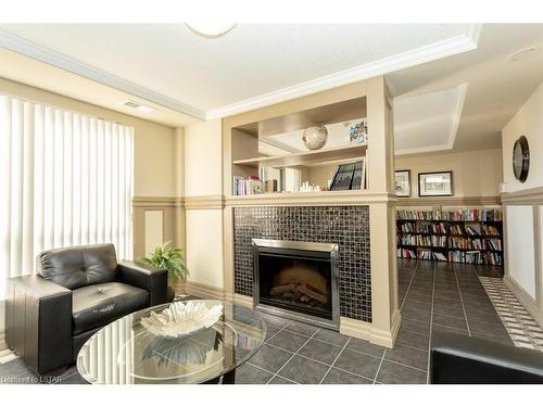 512-1030 Coronation Drive, London, ON - Indoor Photo Showing Living Room With Fireplace