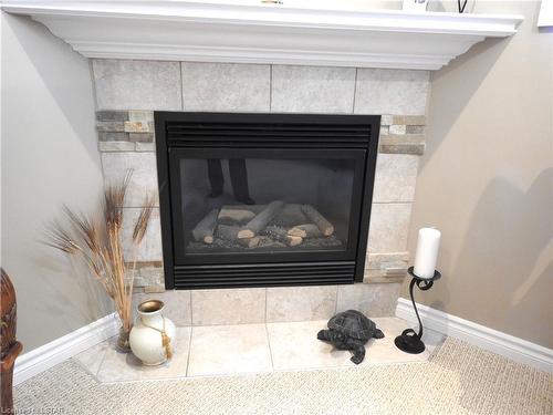 395 Bourdeau Road, London, ON - Indoor Photo Showing Living Room With Fireplace