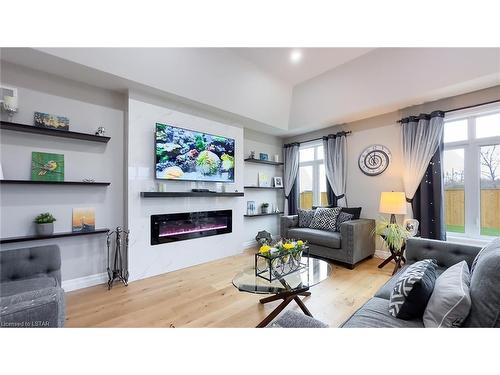 303 Hazelton Lane, Exeter, ON - Indoor Photo Showing Living Room With Fireplace