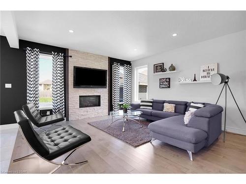 1568 Noah Bend, London, ON - Indoor Photo Showing Living Room With Fireplace