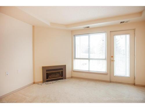 304-511 Gainsborough Road, London, ON - Indoor With Fireplace